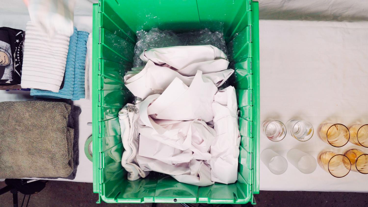 Bin Photo filled with sheets, representing moving supplies NYC