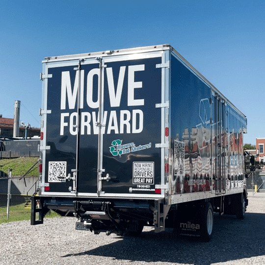 A MNS moving truck with move forward written on the back