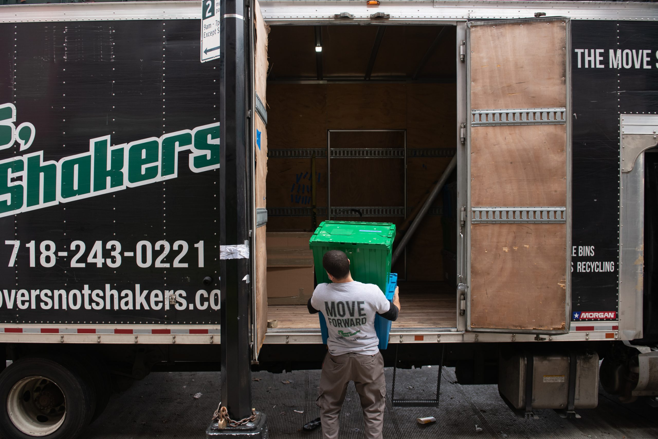 MNS Financial District mover loading a Movers Not Shakers truck