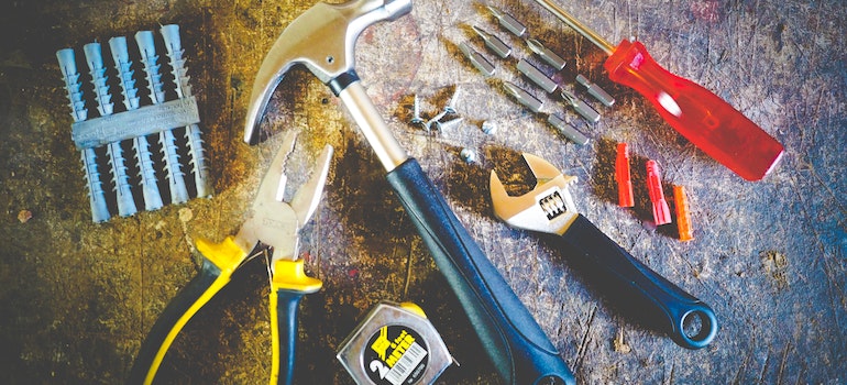 A tool set on the ground used for disassembling and packing your kitchen cabinets