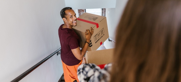 A man carrying a box