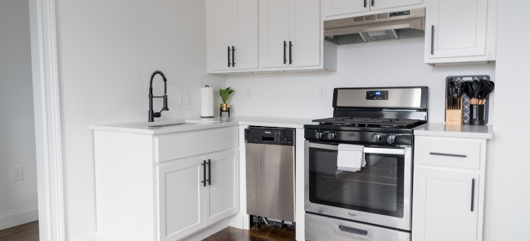 white kitchen with different appliances