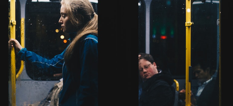 woman standing in the bus 