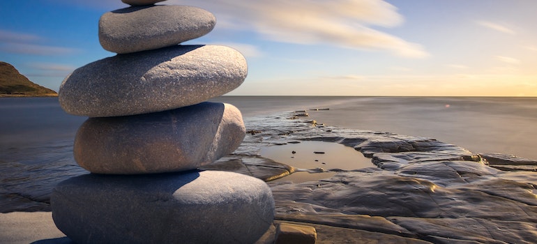 Stacked of stones by the water in Queens