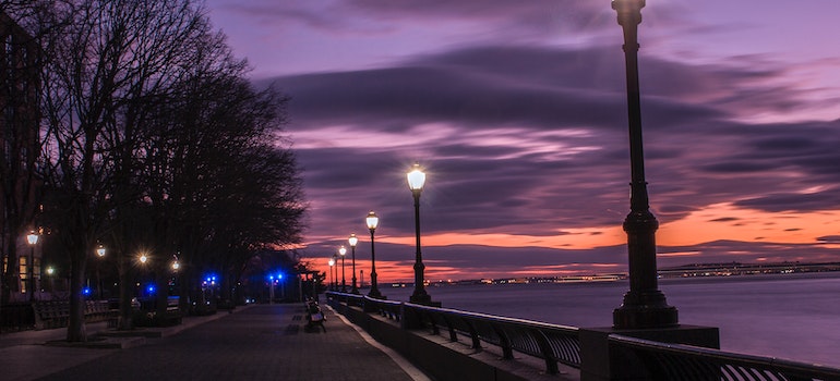 Streetlights along the bay and a pedestrian area