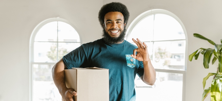 mover holding a box