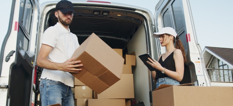 movers next to a moving van