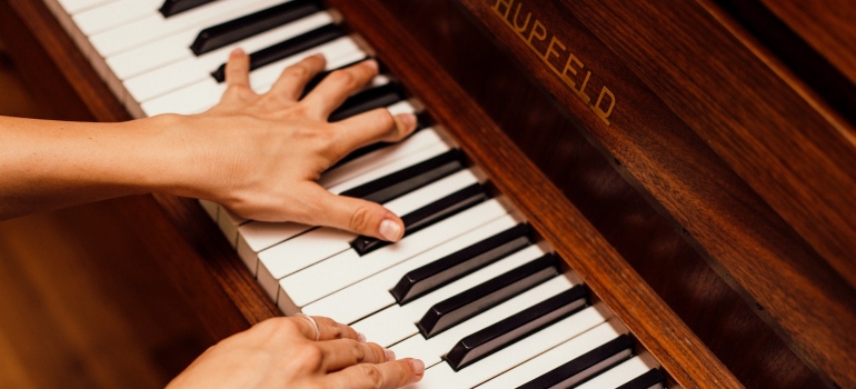 a person playing a piano