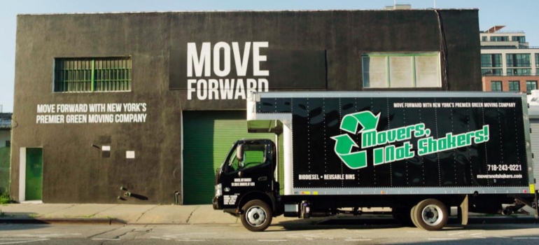 Movers Not Shakers' moving truck with a logo