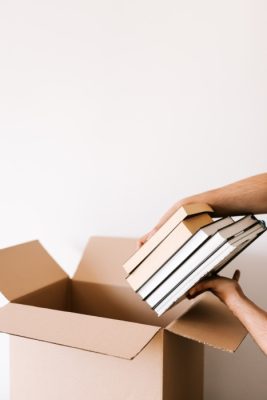 a person packing books