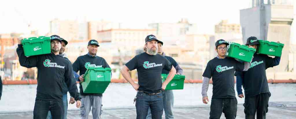 Manhattan beach movers carrying eco-friendly moving boxes